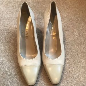 Chanel leather ivory two tone pumps.